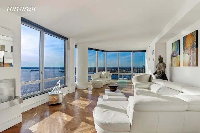 New York City Real Estate | View 10 West Street, 37G | Living Room with Hudson River Views | View 4
