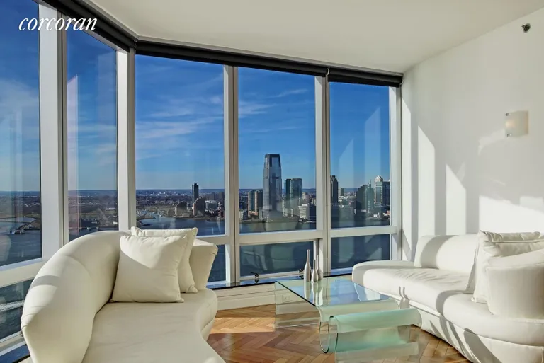 New York City Real Estate | View 10 West Street, 37G | Living Room with Hudson River Views | View 5