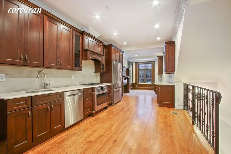 New York City Real Estate | View 139 West 136th Street, 1 | Kitchen;Gallery/Office; Stairs to Lower Level | View 4