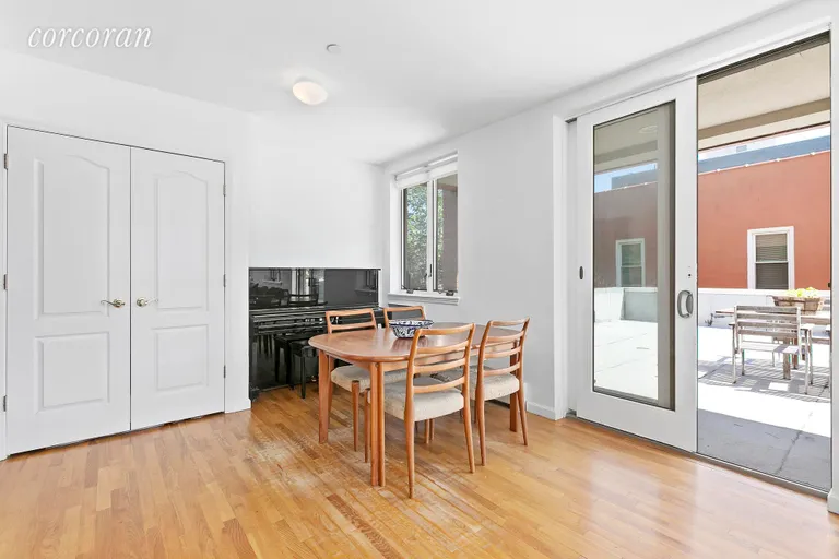 New York City Real Estate | View 811 5th Avenue, 202 | Dining area with terrace access | View 2