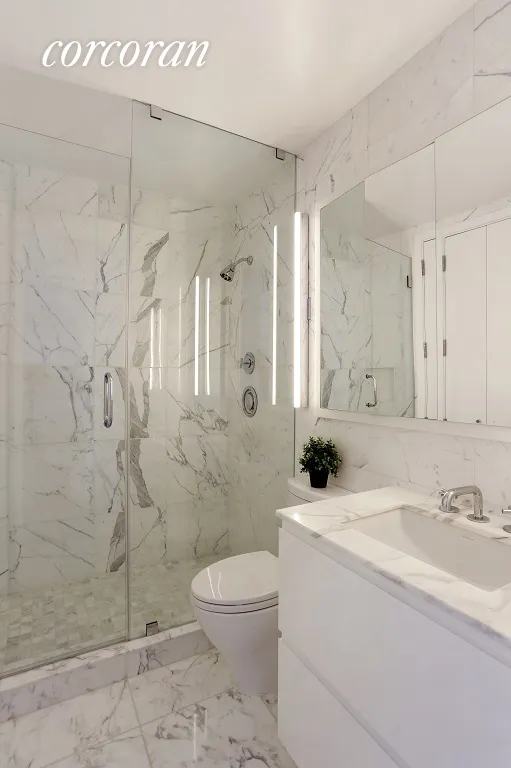 New York City Real Estate | View 145 East 48th Street, 29A | Gorgeous Marble Bathroom | View 5