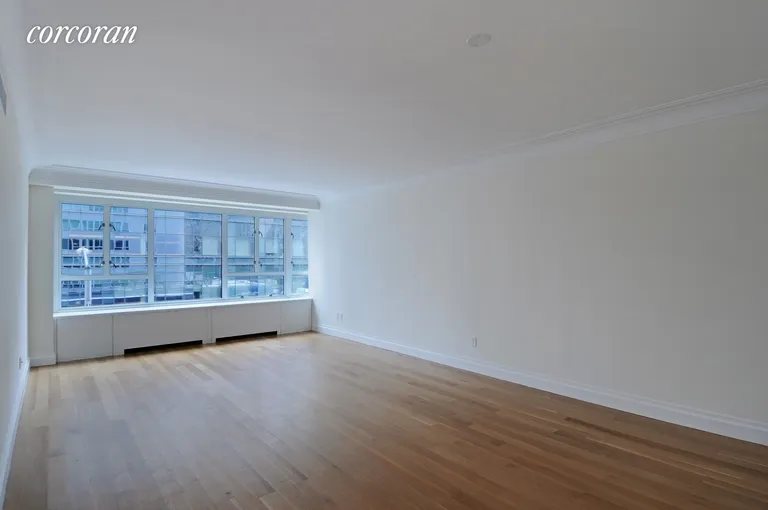 New York City Real Estate | View 200 East 66th Street, E203 | Living Room / Dining Area | View 2
