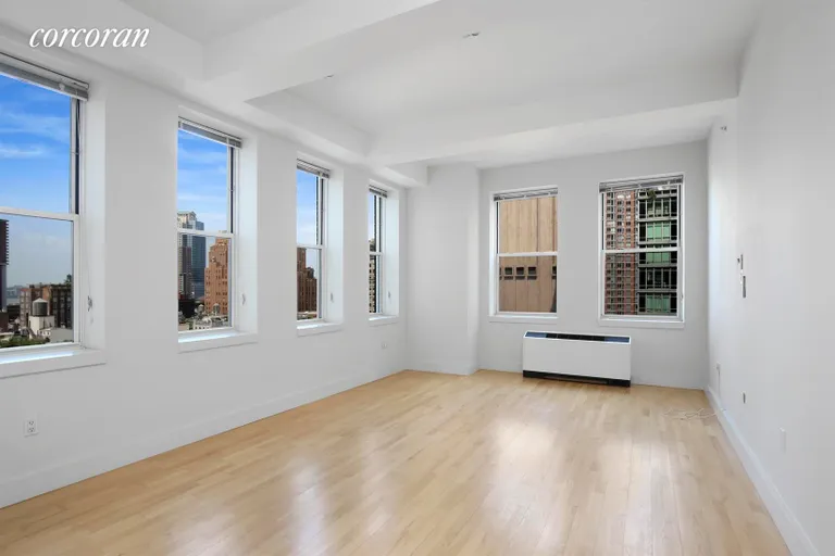 New York City Real Estate | View 80 Chambers Street, 12D | Corner living room with lovely views | View 2