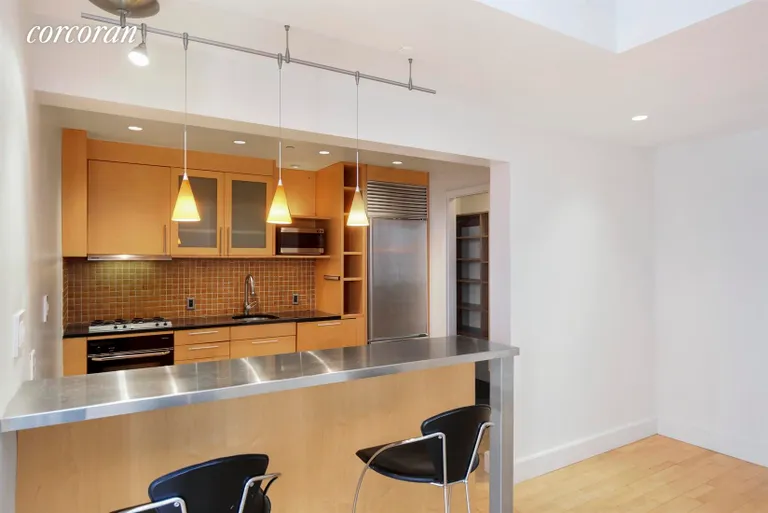 New York City Real Estate | View 80 Chambers Street, 12D | Open kitchen with pantry | View 4
