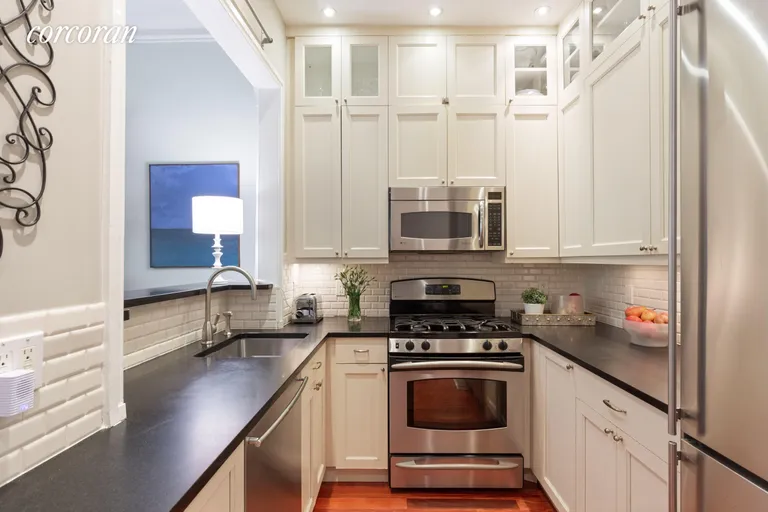 New York City Real Estate | View 557 3rd Street, 3 | Classic & Handsome Kitchen w/Pass-Through Window | View 6