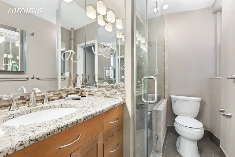 New York City Real Estate | View 75-40 Austin Street, 5FR | Stall shower and custom vanity | View 4