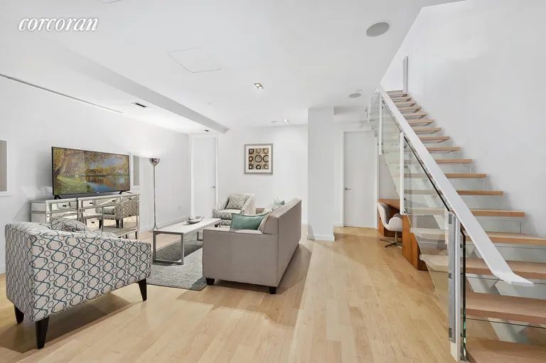 New York City Real Estate | View 447 West 18th Street, GDN3 | Lower Level Living Room | View 4