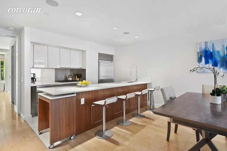 New York City Real Estate | View 447 West 18th Street, GDN3 | Open Kitchen with Breakfast Bar | View 6