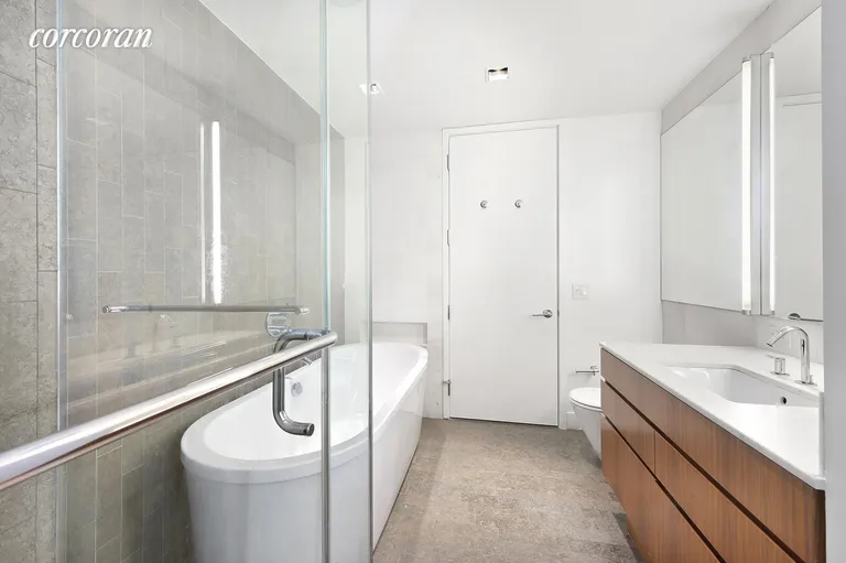 New York City Real Estate | View 447 West 18th Street, GDN3 | Master Bath with Stall Shower and Soaking Tub | View 10