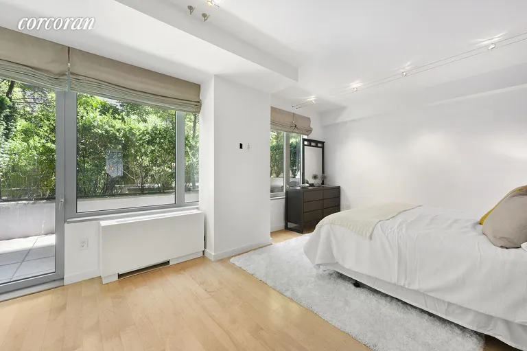 New York City Real Estate | View 447 West 18th Street, GDN3 | Master Bedroom with Private Patio | View 2