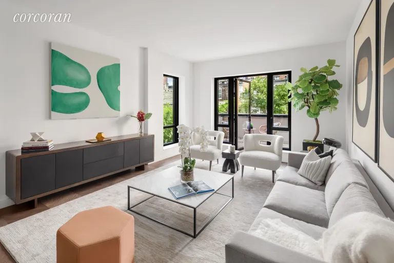 New York City Real Estate | View 211 West 14th Street, 3B | Corner Living Room that opens to Terrace | View 4