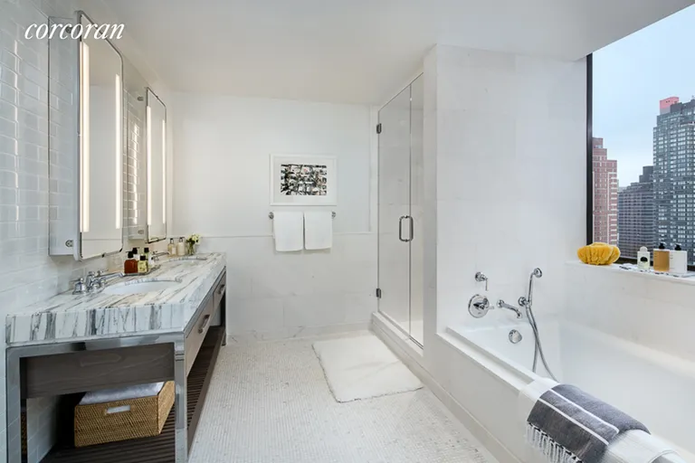 New York City Real Estate | View 389 East 89th Street, 31A | Master bath w/ custom double vanity | View 5
