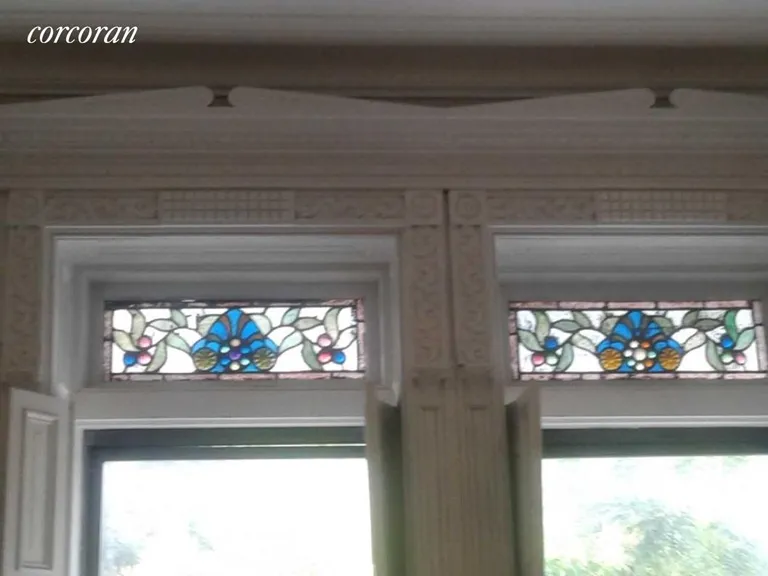 New York City Real Estate | View 279 Jefferson Avenue | double stained glass windows | View 10