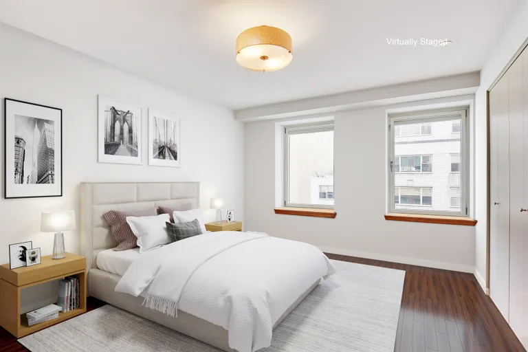 New York City Real Estate | View 201 East 80th Street, 10E | Master Bedroom suite with south-facing windows | View 5