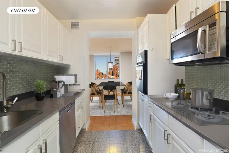 New York City Real Estate | View 170 East 87th Street, W12B | chef's kitchen with stainless appliances | View 4