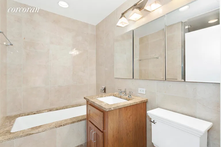 New York City Real Estate | View 45 Park Avenue, 1605 | Marble Bath w/ tub, separate enclosed glass shower | View 5