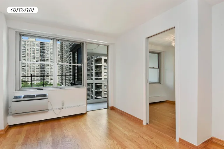 New York City Real Estate | View 303 West 66th Street, 10LW | Living Room & Second Br/Den | View 2