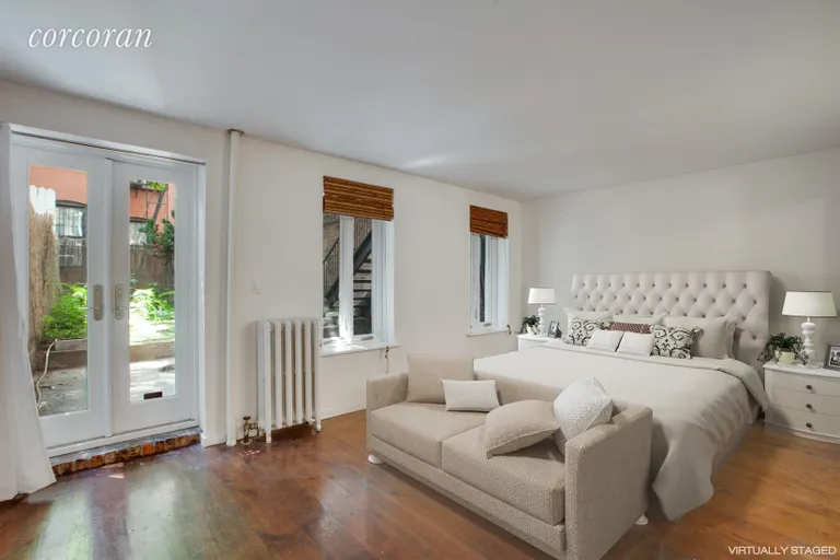 New York City Real Estate | View 114 Saint Marks Place, 1-2 | Master Bedroom | View 17