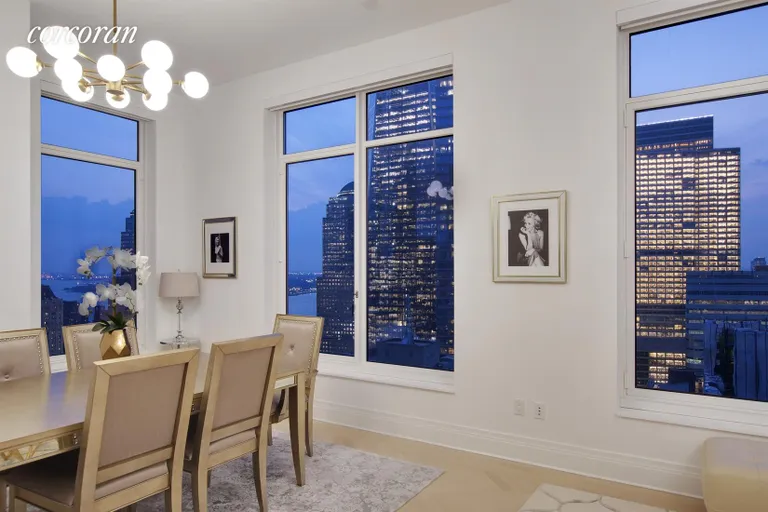 New York City Real Estate | View 30 Park Place, 40E | Evening Living Room | View 2