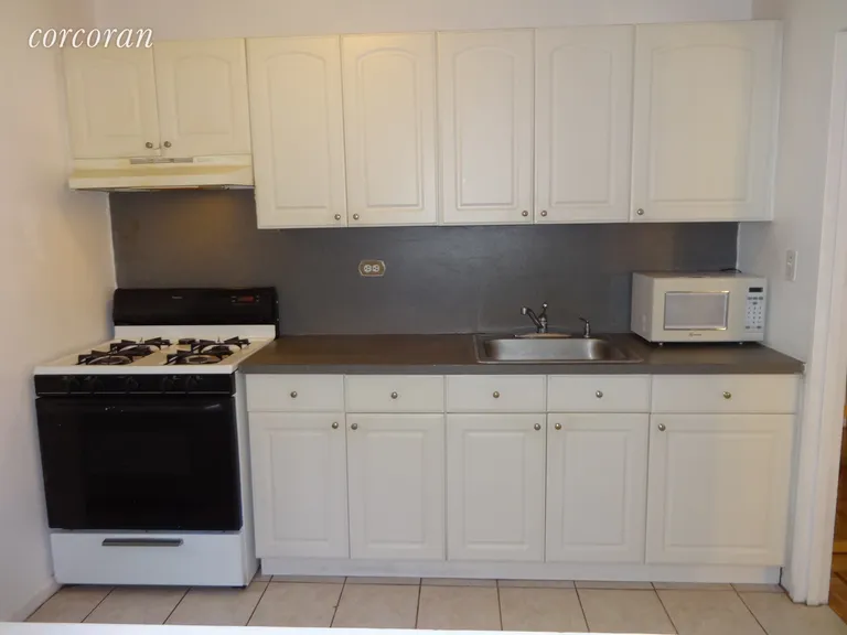New York City Real Estate | View 191 Willoughby Street, 7K | Kitchen & lots of cabinets | View 5