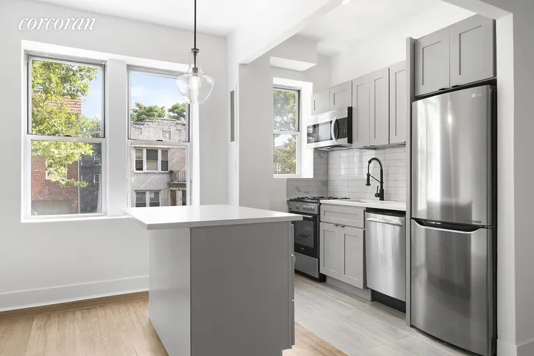 New York City Real Estate | View 59-11 Queens Boulevard, 1A | Stainless steel appliances & custom cabinetry | View 4