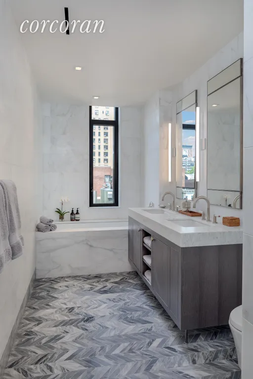 New York City Real Estate | View 211 West 14th Street, 5B | Windowed Master Bath | View 3