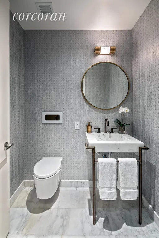 New York City Real Estate | View 211 West 14th Street, 5B | Powder Room | View 4
