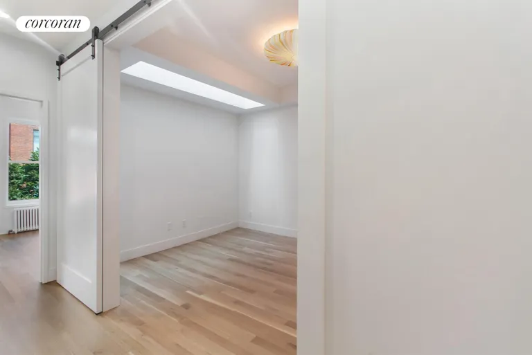 New York City Real Estate | View 330 Carroll Street, 2 | Middle bedroom w/ skylight + barn doors | View 5