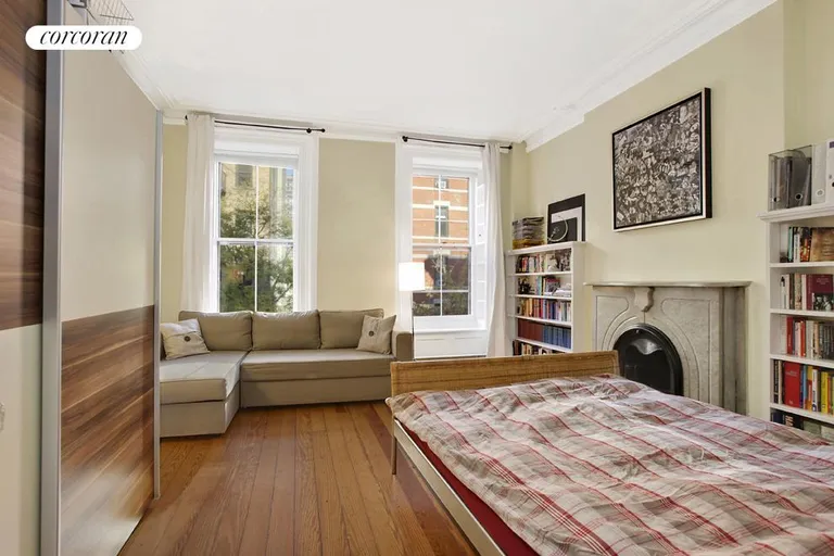 New York City Real Estate | View 184 East 93rd Street, 2 | Second Bedroom with Decorative Fireplace | View 4