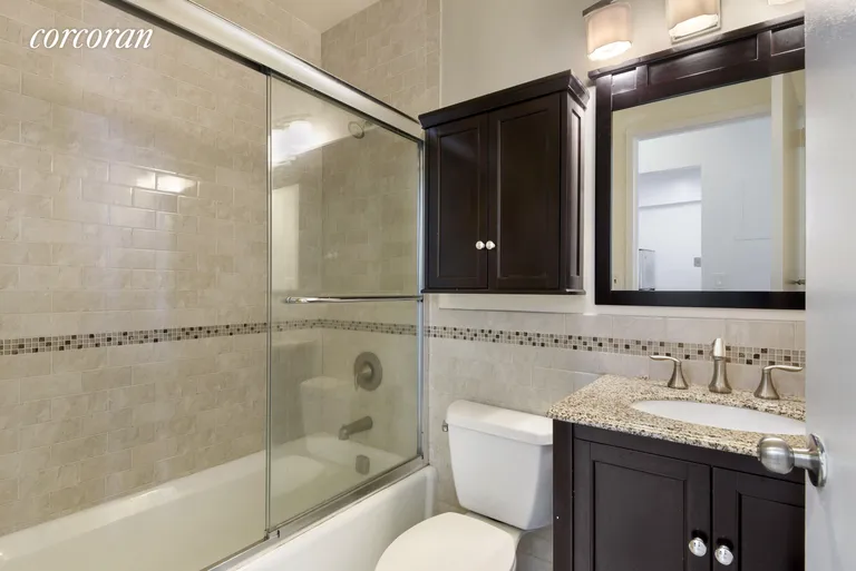 New York City Real Estate | View 250 East 40th Street, 33D | Renovated Bathroom | View 3