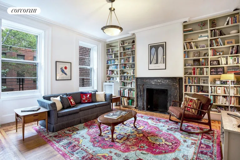 New York City Real Estate | View 169 Hicks Street | Sunny living room w/ floor to ceiling bookshelves | View 2