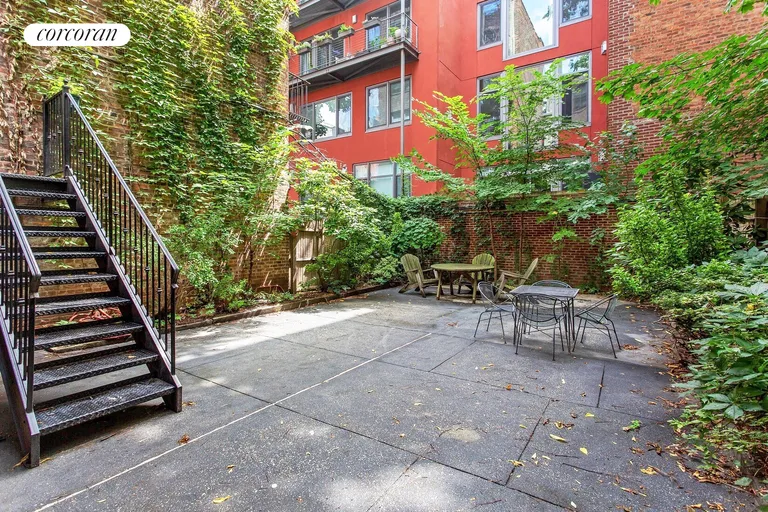 New York City Real Estate | View 169 Hicks Street | Lush backyard greenery | View 12