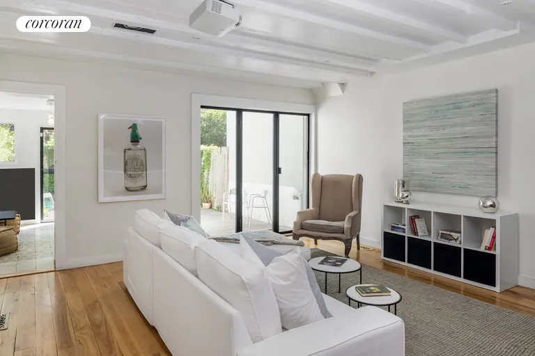 New York City Real Estate | View 158 Saint Johns Place | Sunny living room on the garden floor | View 10