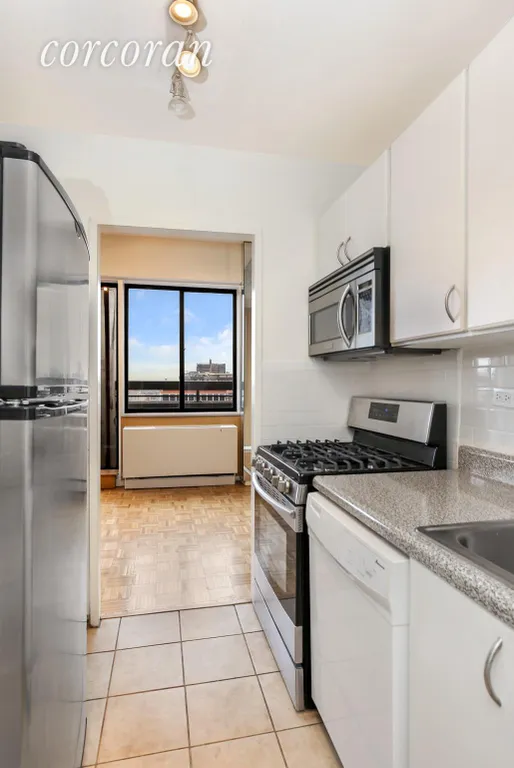 New York City Real Estate | View 347 West 57th Street, PHB | Galley kitchen with annexed dining area  | View 3