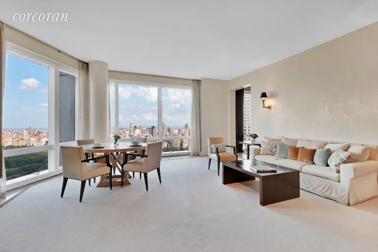 New York City Real Estate | View 25 Columbus Circle, 61B | Spacious living room with park views | View 3