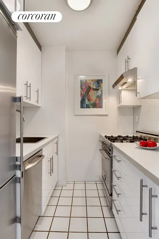 New York City Real Estate | View 225 East 57th Street, 20E | Renovated Kitchen | View 2