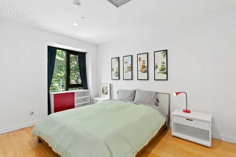 New York City Real Estate | View 251 South 3rd Street, 2B | Bedroom with garden views | View 5