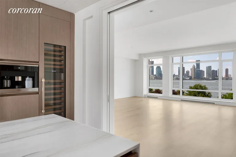 New York City Real Estate | View 70 Vestry Street, 5D | Double pocket doors from Kitchen to Great Room | View 3