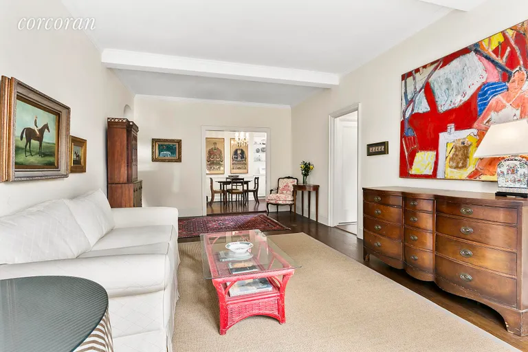 New York City Real Estate | View 229 East 79th Street, 10C | Wide Living Room Lookiy into Dining Area | View 3