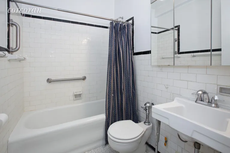New York City Real Estate | View 24 Fifth Avenue, 718 | White tile bathroom  | View 4
