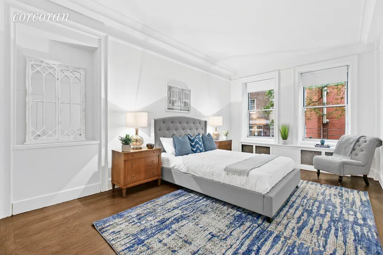New York City Real Estate | View 125 East 72nd Street, 2C | Master bedroom with en-suite bathroom | View 4