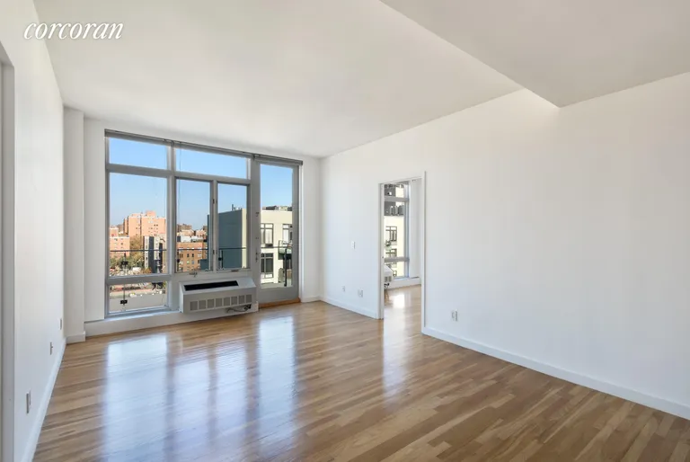 New York City Real Estate | View 333 East 109th Street, PHE | Living | Dining Room with Hardwood Floors | View 2