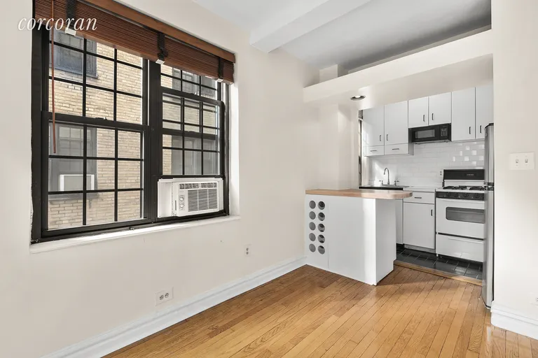 New York City Real Estate | View 102 East 22nd Street, 7E | Windowed Kitchen | View 3