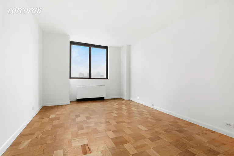 New York City Real Estate | View 630 First Avenue, 26R | KIng-sized bedroom with full river views. | View 6