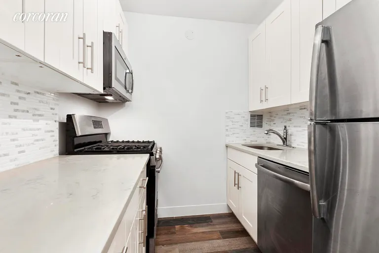 New York City Real Estate | View 630 First Avenue, 26R | Renovated chef's kitchen w/ tons of cabinets. | View 7