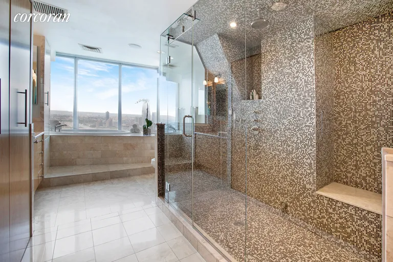New York City Real Estate | View 10 West Street, PH2C | Master Bathroom with Direct Western River Views | View 6