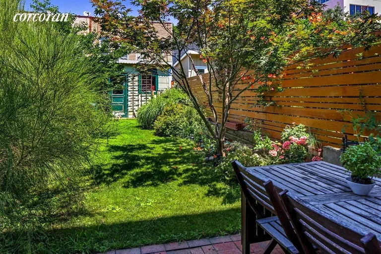 New York City Real Estate | View 451 37th Street | Peaceful Garden with Dining Space & Storage Shed | View 17