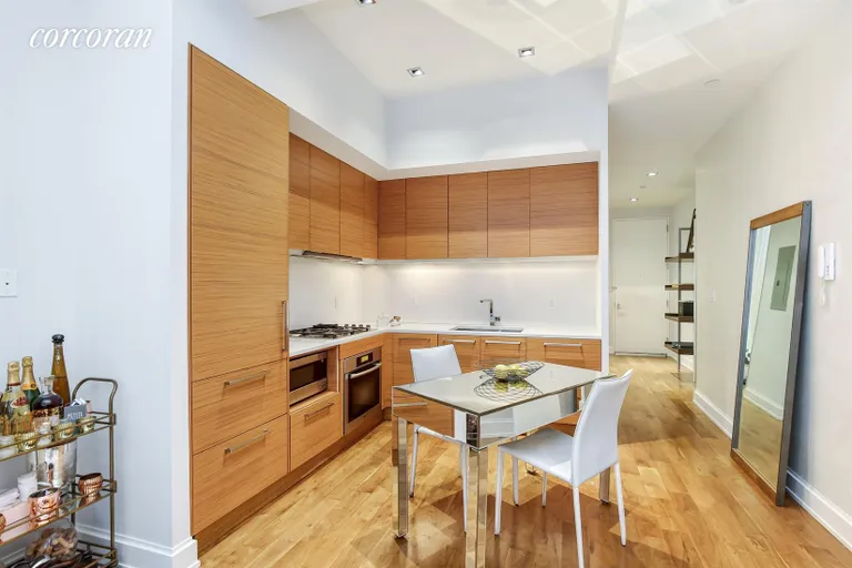 New York City Real Estate | View 140 West 22Nd Street, 2E | Kitchen & Dining Area | View 2