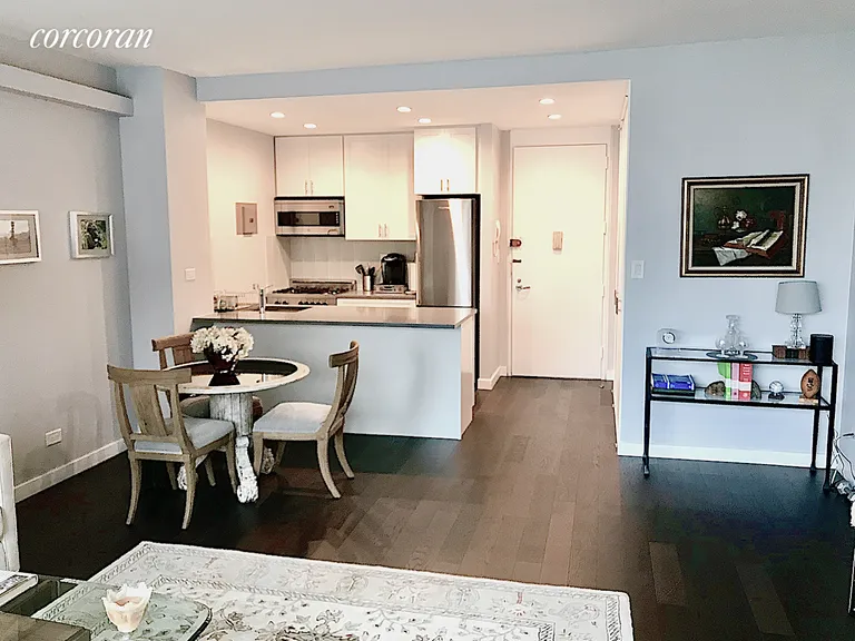 New York City Real Estate | View 45 West 67th Street, 14F | LR showing Dining Area & Kitchen | View 5