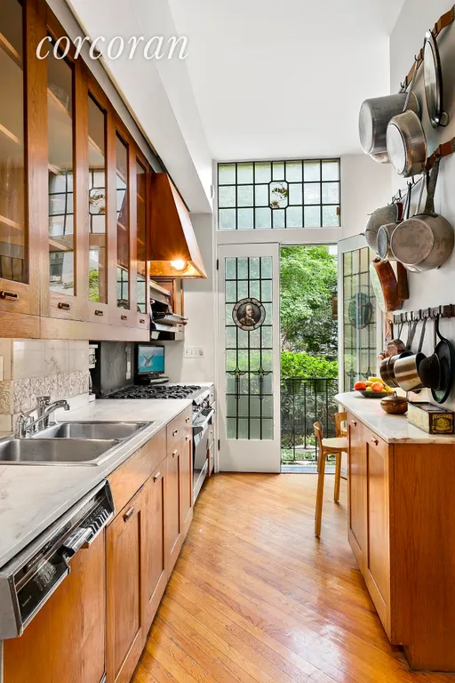 New York City Real Estate | View 265 Henry Street, UPPER QUADRAPLEX | stained glass French doors and Juliet balcony | View 6